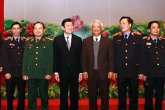 Chủ tịch nước Trương Tấn Sang với các đại biểu dự hội nghị. (Ảnh: Nguyễn Khang/TTXVN)