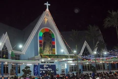 Đêm Giáng Sinh ở nhà thờ. (Ảnh minh họa; Sỹ Huynh/TTXVN)