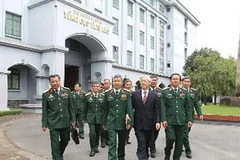 Tổng Bí thư Nguyễn Phú Trọng, Bí thư Quân ủy Trung ương thăm và làm việc với Tổng cục II - Bộ Quốc phòng. (Ảnh: Trí Dũng/TTXVN)