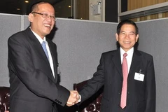 Chủ tịch nước Nguyễn Minh Triết gặp Tổng thống Philippines, Benigno Aquino. (Ảnh: Nguyễn Khang/TTXVN) 