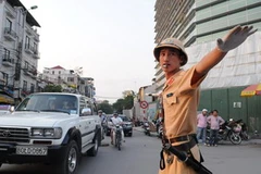 Từ ngày 20/5, cảnh sát giao thông tại Hà Nội và TP. Hồ Chí Minh sẽ áp dựng mức xử phạt nặng gấp đôi với người vi phạm. (Ảnh:Thanh Giang/TTXVN)