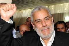 Chủ tịch PJD Abdelilah Benkirane biểu thị niềm vui chiến thắng khi kết quả sơ bộ bầu cử quốc hội Morocco được công bố. (Nguồn: Getty Images)