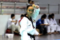 Dương Thị Lê Dung (Tây Hồ, Hà Nội) đoạt huy chương vàng quyền cá nhân nữ với thành tích 47,9 điểm. (Ảnh: Ngọc Trường/TTXVN)