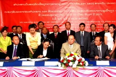 Quang cảnh lễ ký kết. (Ảnh: Hoàng Chương/Vietnam+)