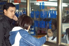 Chi trả bảo hiểm y tế. (Ảnh: Dương Ngọc/TTXVN)