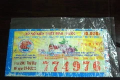 Tờ vé số trúng thưởng. (Ảnh: Tất Thành/Vietnam+)