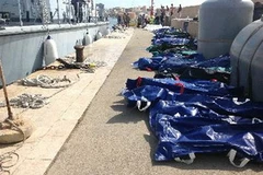 Xác các nạn nhân trong vụ tai nạn. (Nguồn: AFP/TTXVN)