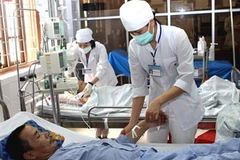 Khám chữa bệnh ở bệnh viện đa khoa Bắc Thăng Long, Hà Nội. (Ảnh: Hữu Oai/TTXVN)