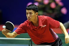 Tay vợt Đinh Quang Linh (Việt Nam) thi đấu nội dung đơn nam. (Ảnh: Quốc Khánh/TTXVN)