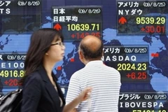 Chứng khoán châu Á-Thái Bình Dương ngày 1/12 đã vững lên sau vụ Dubai World. (Ảnh: AP)