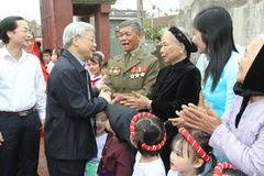 Tổng Bí thư Nguyễn Phú Trọng tới dự "Ngày hội đại đoàn kết toàn dân tộc" tại xã Hải Bắc, huyện Hải Hậu (Nam Định). (Ảnh: Trí Dũng/TTXVN)