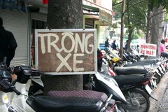 Một điểm trông giữ xe máy, xe đạp ở Hà Nội. (Nguồn: Báo Người lao động)