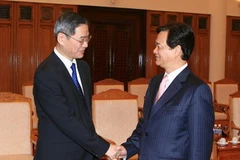 Thủ tướng Nguyễn Tấn Dũng tiếp Thứ trưởng Ngoại giao Trung Quốc, Trương Chí Quân. (Ảnh: Thống Nhất/TTXVN)