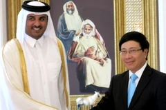 Bộ trưởng Ngoại giao Phạm Bình Minh gặp Hoàng Thái tử Qatar Tamim bin Hamad al-Thani. (Nguồn: Bộ Ngoại giao)