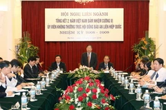 Phó Thủ tướng, Bộ trưởng Ngoại giao Phạm Gia Khiêm chủ trì Hội nghị tổng kết hai năm Việt Nam là Ủy viên không Thường trực Hội đồng bảo an Liên hợp quốc. (Ảnh: Nhan Sáng/TTXVN) 