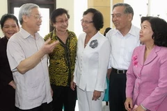 Tổng Bí thư Nguyễn Phú Trọng với các đại biểu dự hội nghị. (Ảnh: Trí Dũng/TTXVN)