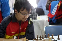 Kỳ thủ Nguyễn Ngọc Trường Sơn là một trong những kỳ thủ hàng đầu tham dự giải cờ vua nhanh, chớp nhoáng toàn quốc. (Ảnh: Quốc Khánh/TTXVN)