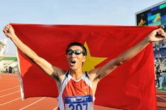 Vận động viên Nguyễn Đình Cương tiếp tục giúp điền kinh và thể thao Việt Nam gặt hái huy chương vàng. (Ảnh:Quốc Khánh/TTXVN) 