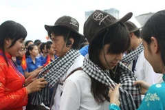 Các đại biểu thanh niên Đông Nam Á được chào đón trong ngày tới Thành phố Hồ Chí Minh. (Ảnh: Thanh Vũ/TTXVN)