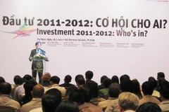 Ông Nguyễn Đức Vinh, Tổng Giám đốc Techcombank trình bày tham luận tại hội nghị. (Ảnh: pv/Vietnam+)