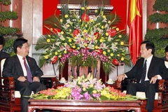 Chủ tịch nước Trương Tấn Sang tiếp Tỉnh trưởng Vân Nam Lý Kỷ Hằng đang ở thăm và làm việc tại Việt Nam. (Ảnh: Nguyễn Khang/TTXVN)