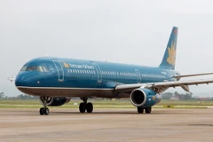 Máy bay của Vietnam Airlines chuẩn bị cất cánh tại sân bay quốc tế Nội Bài. (Ảnh: Huy Hùng/TTXVN)