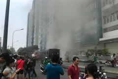 Hiện trường vụ cháy chung cư Carina Plaza. (Ảnh: Thành Chung/TTXVN)