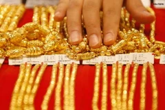 Giá vàng giảm sau ba phiên tăng nhẹ do tin về QE3