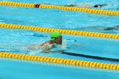 Vận động viên Nguyễn Thành Trung vượt lên để về đích đầu tiên. (Ảnh: Đỗ Quyên/Vietnam+)