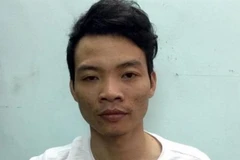 Đối tượng Trần Văn Phương bị bắt giữ. (Ảnh: Lê Tú/TTXVN phát)