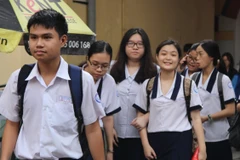 Thí sinh tại điểm thi Trường Trung học Phổ thông Marie Curie, quận 3 (TP Hồ Chí Minh). (Ảnh: Xuân Dự/TTXVN)