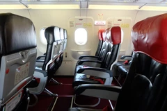 Cửa thoát hiểm trên máy bay sẽ đảm bảo toàn bộ khách được thoát hiểm ra ngoài trong trường hợp có sự cố xảy ra.. (Ảnh: PV)