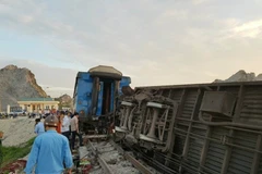 Tuyến đường sắt Bắc-Nam đã chính thức được thông tuyến sau vụ lật 6 toa tàu ở Thanh Hóa. (Ảnh: TTXVN)