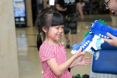 Vietnam Airlines đã triển khai nhiều hoạt động ý nghĩa trong chiến dịch Hành trình yêu thương. (Ảnh: VNA cung cấp)