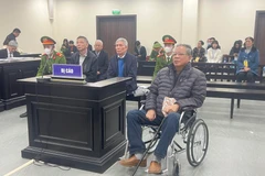 Các bị cáo tại phiên xử ngày 27/12. (Ảnh: Kim Anh/TTXVN)