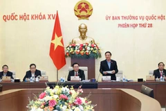 Phó Chủ tịch Quốc hội Nguyễn Khắc Định điều hành phiên họp. (Ảnh: Doãn Tấn/TTXVN)