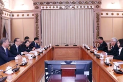 Phó Chủ tịch UBND Thành phố Hồ Chí Minh Võ Văn Hoan tiếp ông Lưu Hiểu Khải, Chủ tịch Chính hiệp tỉnh Vân Nam, Trung Quốc. (Ảnh: Xuân Khu/TTXVN)