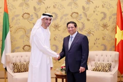 Thủ tướng Phạm Minh Chính tiếp ông Thani bin Ahmed Al Zeyoudi, Quốc vụ khanh phụ trách Thương mại quốc tế, Bộ Ngoại thương UAE. (Ảnh: Dương Giang/TTXVN)