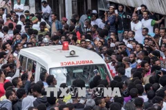 Xe cứu thương Ethiopia được triển khai tới tại hiện trường vụ nổ ở thủ đô Addis Ababa ngày 23/6. (Nguồn: AFP/TTXVN) 