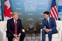 Tổng thống Mỹ Donald Trump và Thủ tướng Canada Justin Trudeau. (Nguồn: AFP/TTXVN)