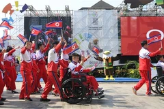 Phái đoàn Triều Tiên tới Làng VĐV ở Jakarta, Indonesia để tham dự Asian Para Games ngày 4/10/2018. (Ảnh: Yonhap/TTXVN)