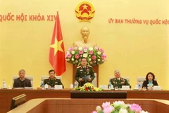 Đại tướng Đỗ Bá Tỵ, Phó Chủ tịch Quốc hội tiếp Đoàn đại biểu Cựu chiến binh Vị Xuyên, tỉnh Hà Giang. (Ảnh: An Đăng/TTXVN)