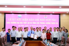 Lễ ký thỏa thuận. (Ảnh: Thu Lương/Vietnam+)