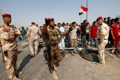 Binh sỹ Iraq làm nhiệm vụ tại cảng Umn Qasr ở thành phố Basra. (Nguồn: Reuters)