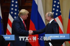 Tổng thống Mỹ Donald Trump (trái) và Tổng thống Nga Vladimir Putin trong cuộc họp báo chung kết thúc Hội nghị thượng đỉnh ở Helsinki, Phần Lan ngày 16/7. (Nguồn: AFP/ TTXVN) 