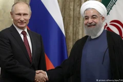 Tổng thống Nga Vladimir Putin và người đồng cấp Iran Hassan Rouhani. (Nguồn: TASS) 