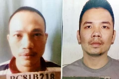 Tử tù Nguyễn Văn Tình (bên phải) và tử tù Lê Văn Thọ. (Nguồn: TTXVN)