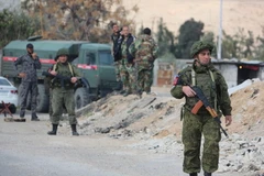  Quân cảnh Nga tại trạm kiểm soát ở Wafideen, ngoại ô Damascus (Syria) ngày 9/3. (Nguồn: AFP/TTXVN)