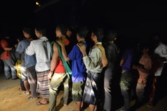 Những người nhập cư bất hợp pháp tại Malaysia. (Nguồn: AFP/TTXVN)