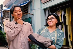 Các diễn viên Trấn Thành và Lê Giang trên phim trường ''Bố già.'' (Ảnh: Nhà phát hành)